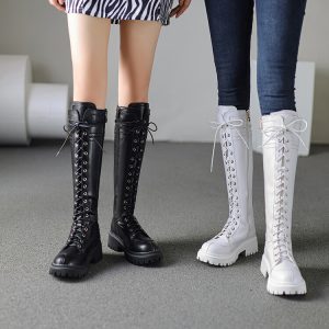 Women's High Shaft Platform Boots with Cross Straps and Metal Accents